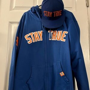 NY Mets The 7 Line “Stay True” Hooded Sweatshirt and “Stay True” SnapBack Hat.